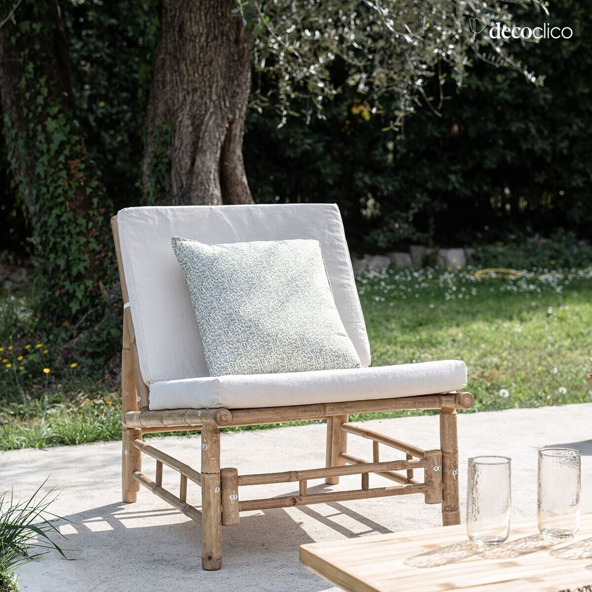 Low armchair in natural bamboo Taman