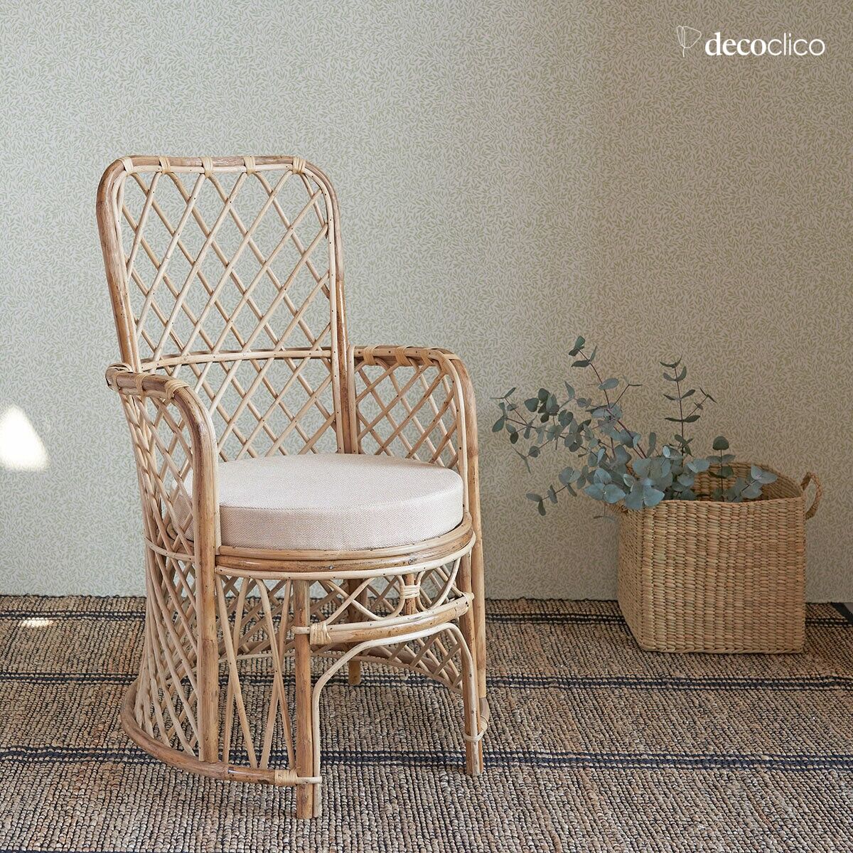 Natural rattan armchair with cotton cushion